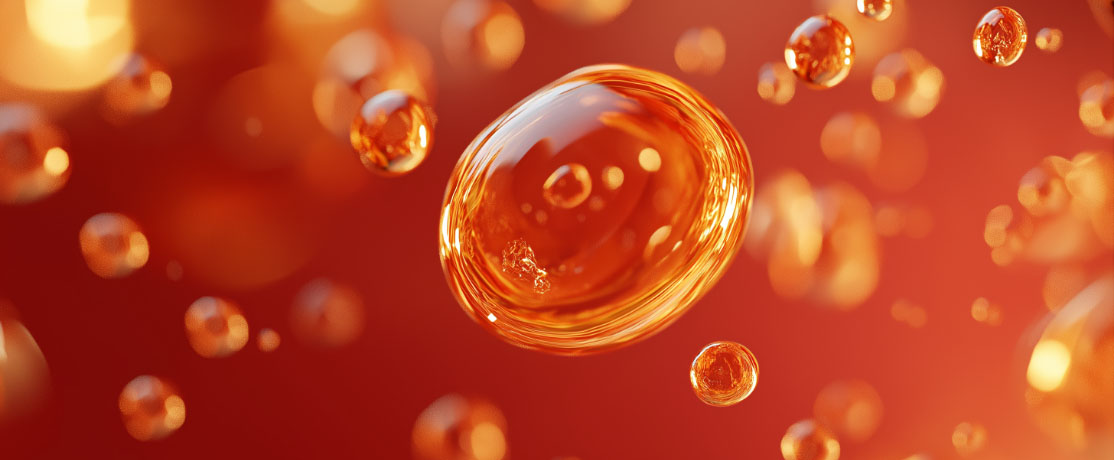 Flüssige Omega-3 Tropfen in warmen Farbtönen als Darstellung von Omega-3 Fettsäuren